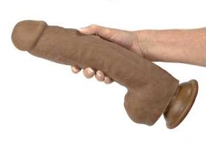 person holding Adam's 12-inch Colossal Dildo, an extremely large realistic dildo