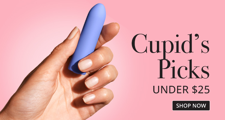 woman holding small vibrator