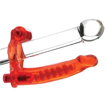 Double Penetrator Ultimate Penis Ring shown on glass rod