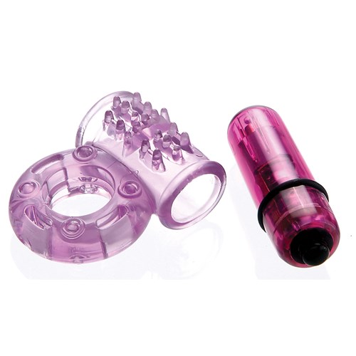 O Wow Vibrating Ring purple on table with bullet removed