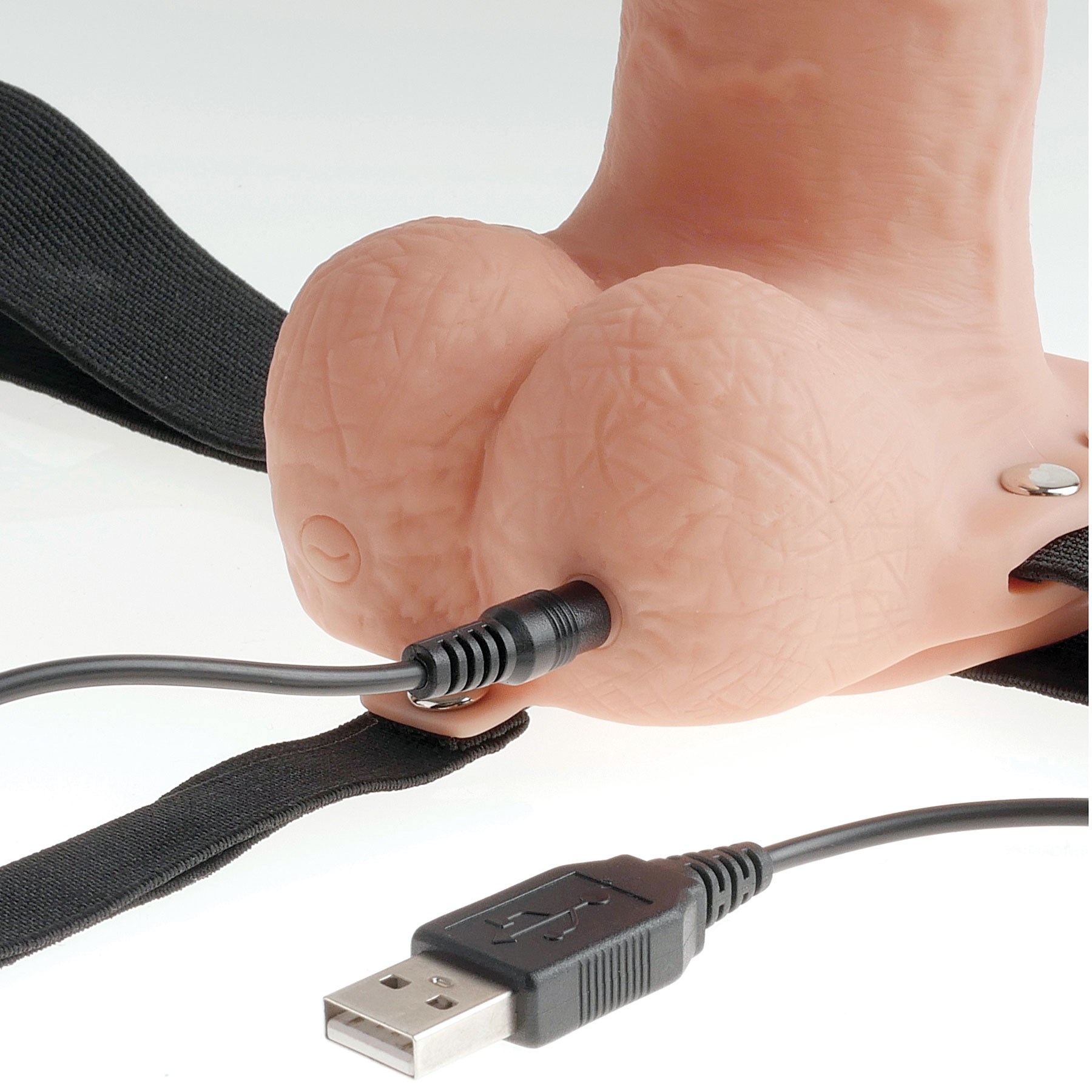 9" Hollow Rechargeable Strap-On With Balls charger