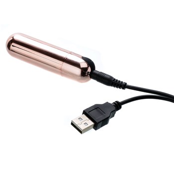 Rosy Gold Rechargeable Bullet with charger cord plugged into base