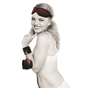 Sex & Mischief Enchanted Bondage Kit - Model Wearing Cuffs and Blindfold