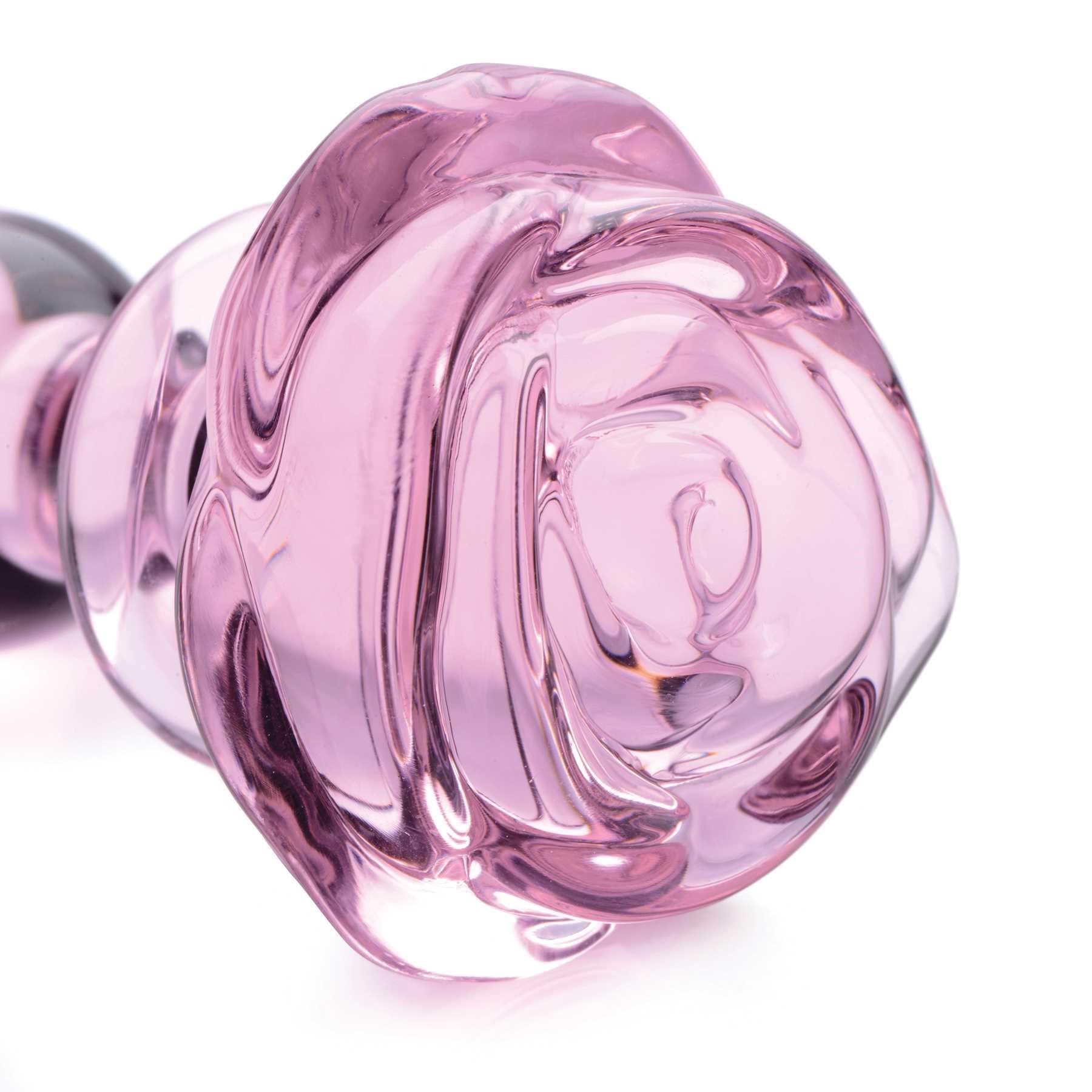 Booty Sparks Pink Rose Glass Anal Plug angled view of rose tip