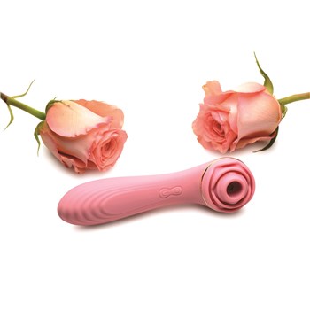 Bloomgasm Passion Petals Suction Rose Vibrator Product Shot with Roses #1 - Pink