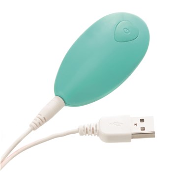 Inya Venus Remote Control Stimulator - Showing Where Charging Cable is Placed in Remote