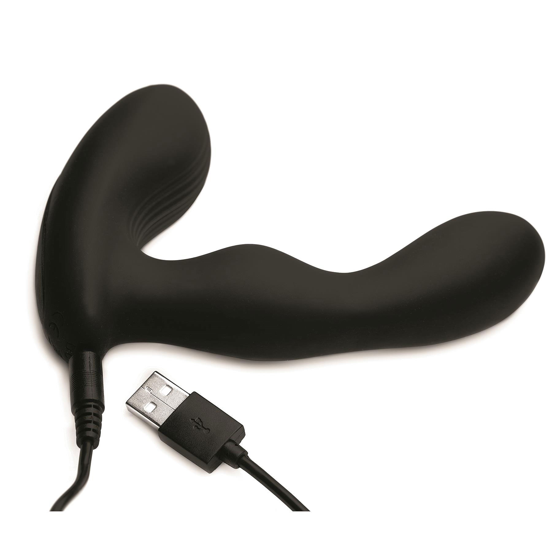 Alpha Pro 7X Prostate Massager with USB charger plugged into base of toy