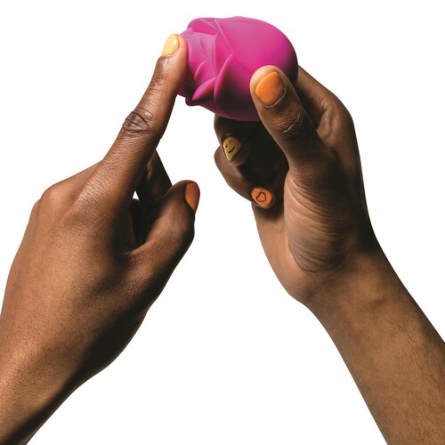 Romp Rose Clitoral Stimulator - Hand Shot to Show Size