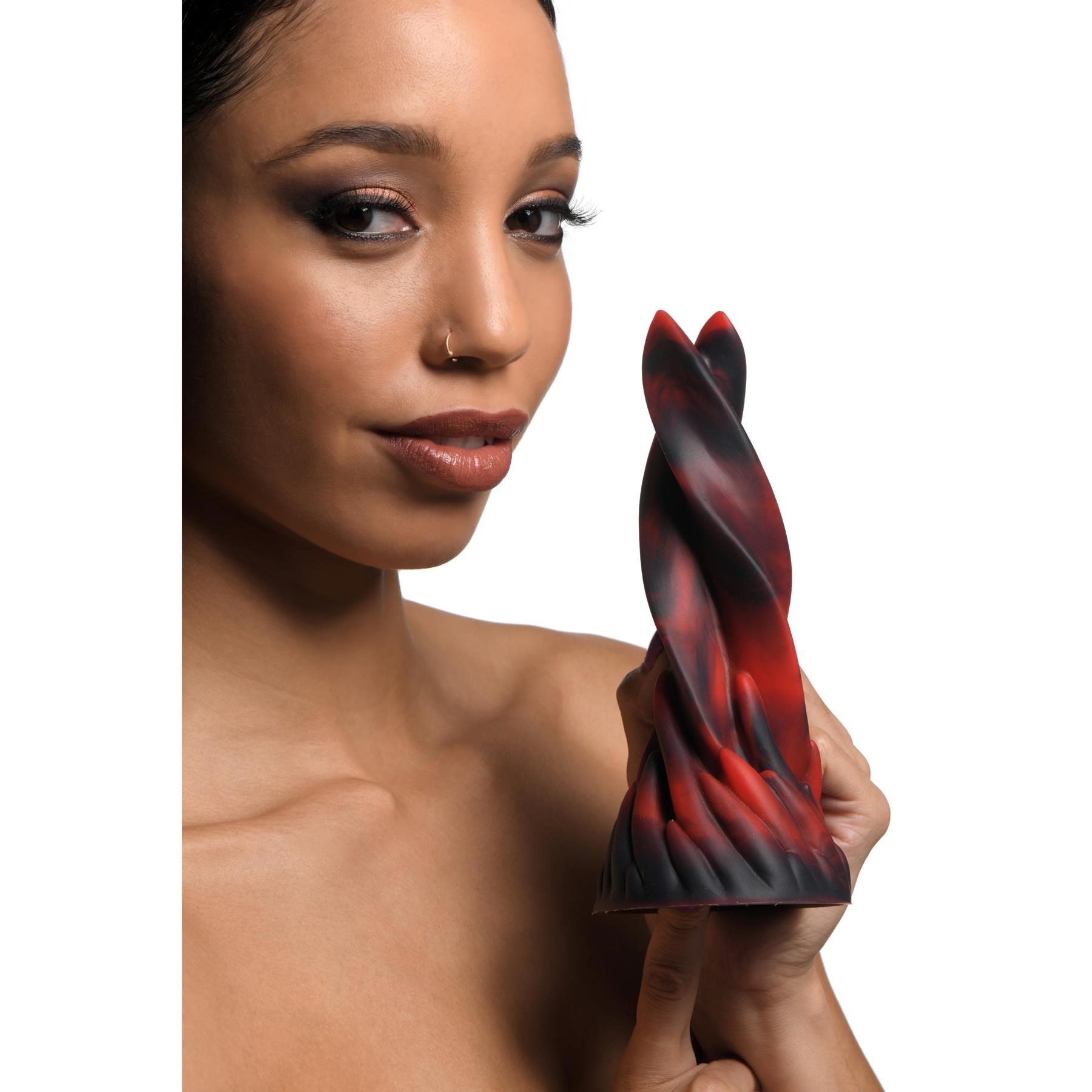 CreatureCocks Hell Kiss Twisted Tongue Dildo model holding