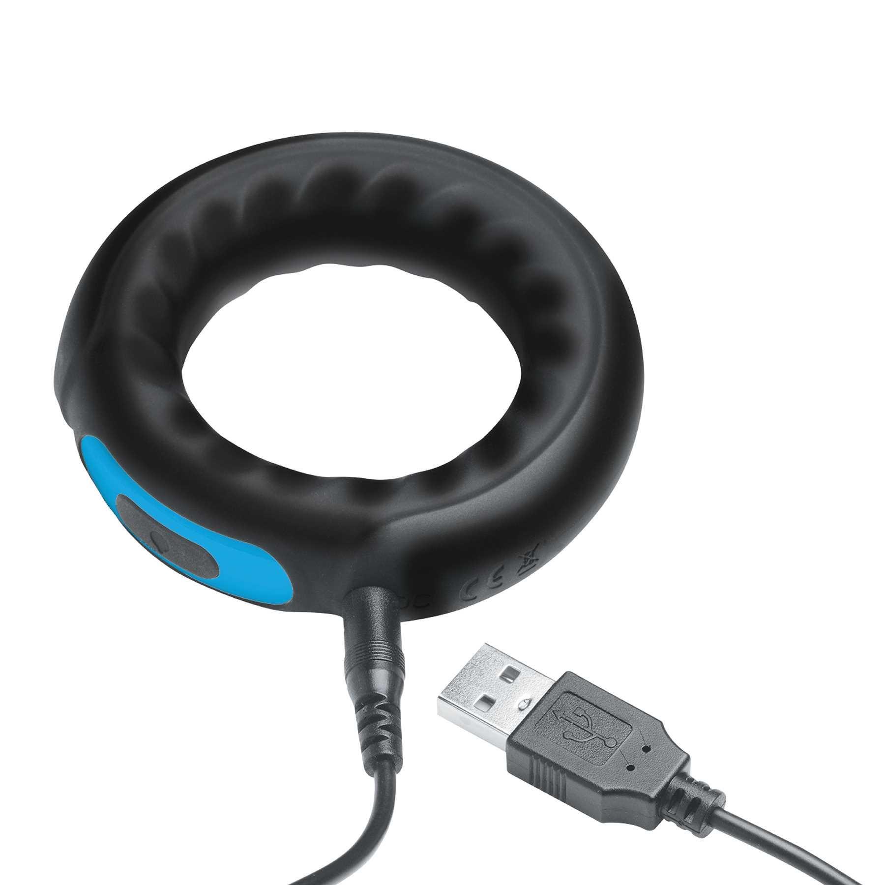 Power Performance Ring with USB charger plugged into  toy