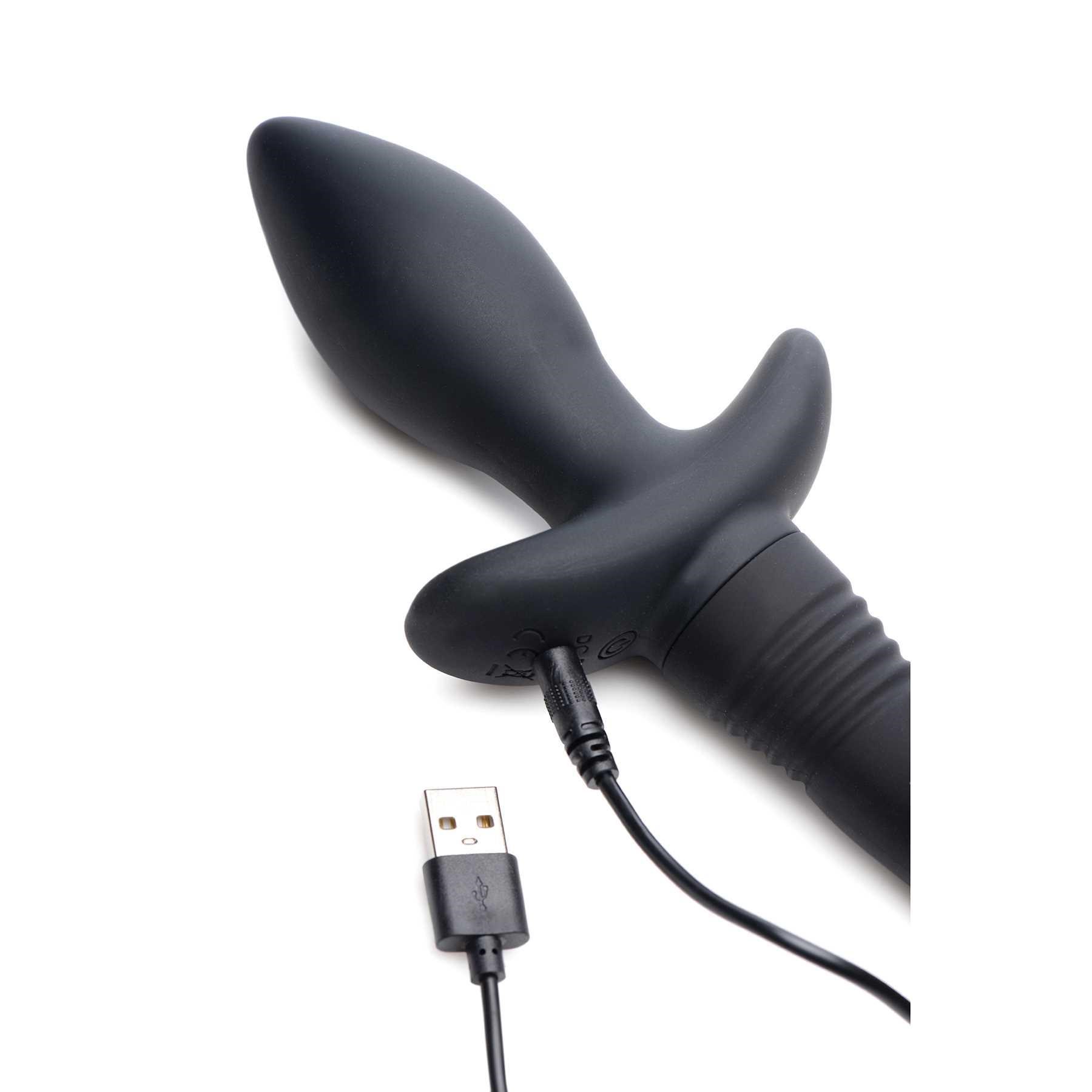 Wagging & Vibrating Puppy Tail Anal Plug with USB charger plugged into toy