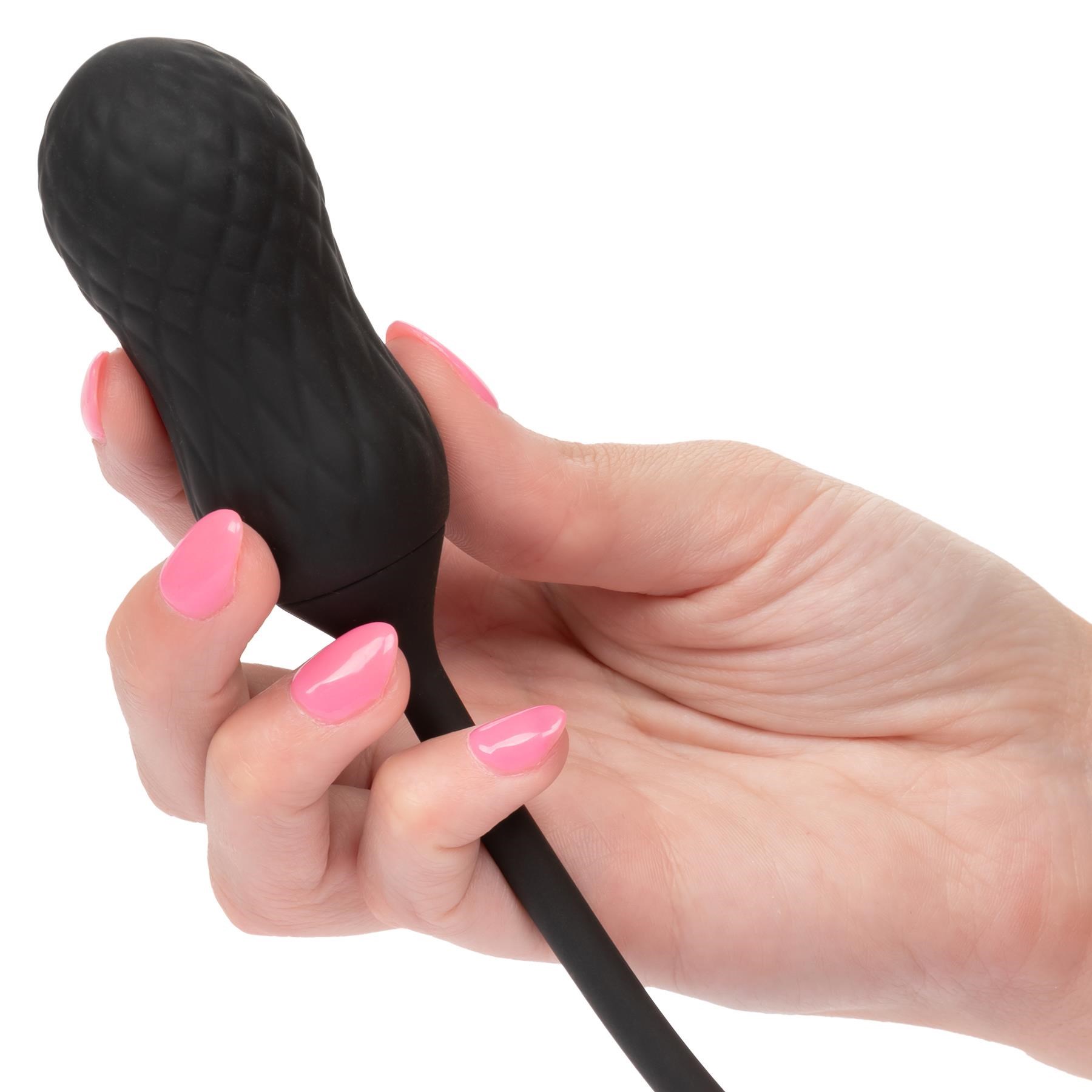 French Kiss Elite Siren Clitorial and Anal Stimulator - Hand Shot - With Anal Plug