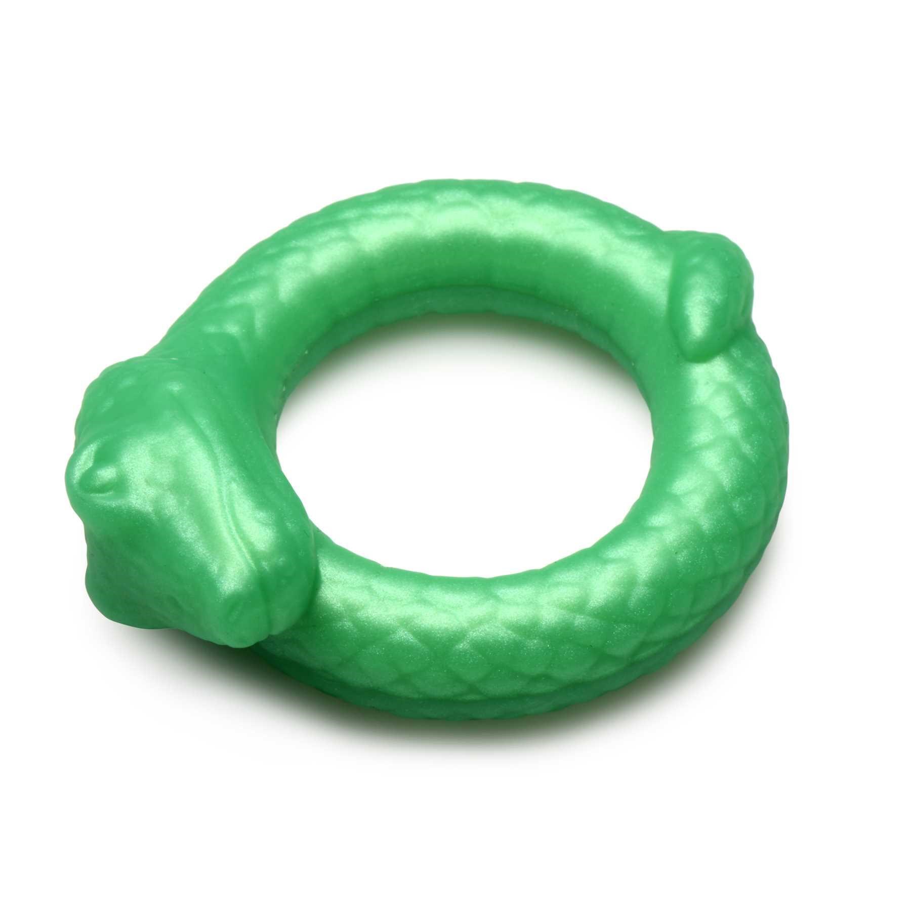 Creature Cocks Serpentine Silicone Cock Ring laying flat on table
