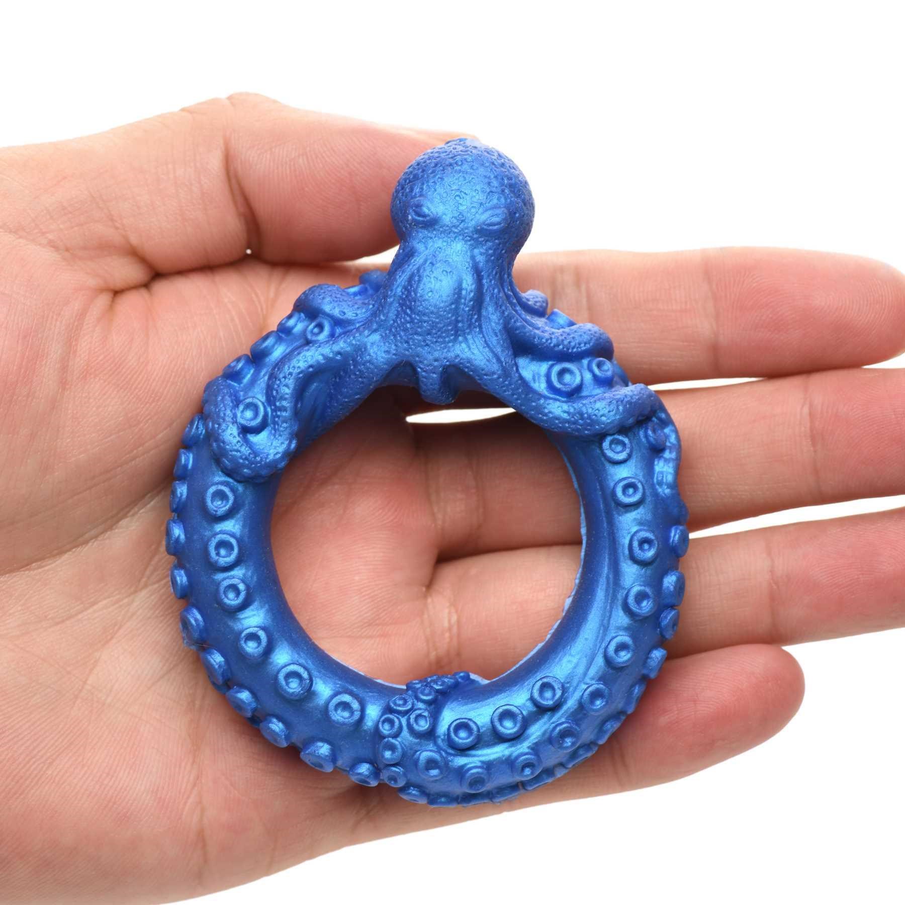 Creature Cocks Poseidon's Octo-Ring Silicone Cock Ring laying on a hand