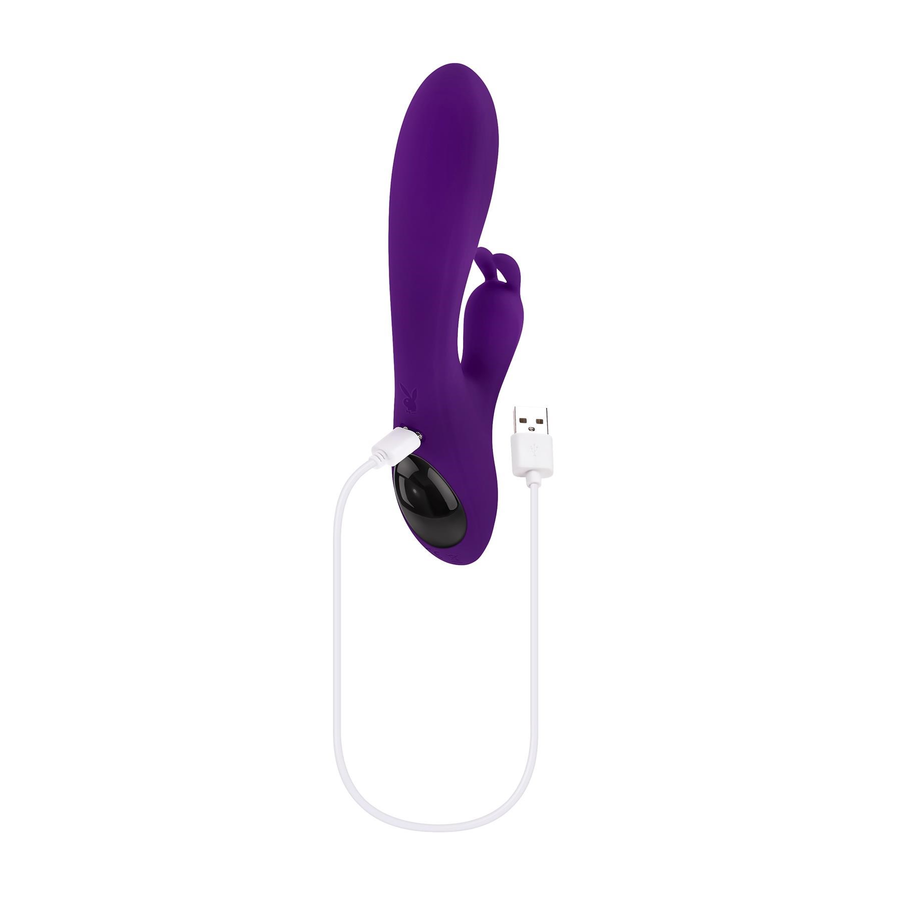 Playboy Pleasure On Repeat Rabbit Vibrator - Product Shot With Charging Cable