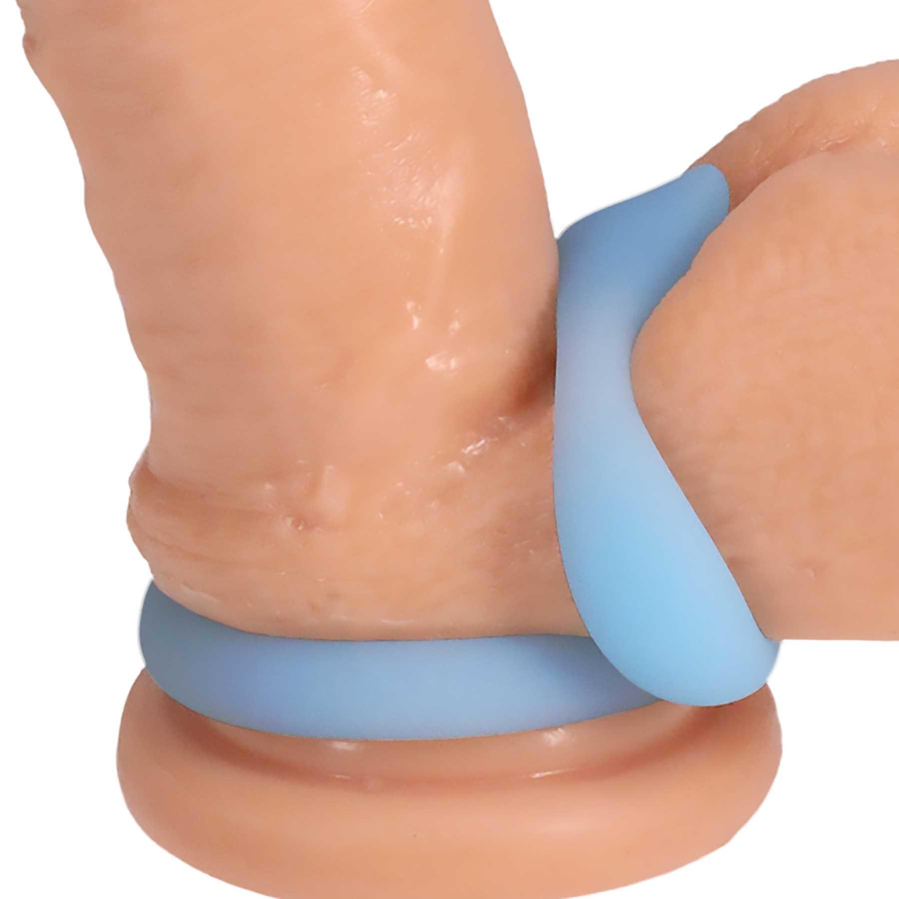 Rock Solid Glow-In-Dark Dual Enhancer Ring on dildo with one ring around base of balls