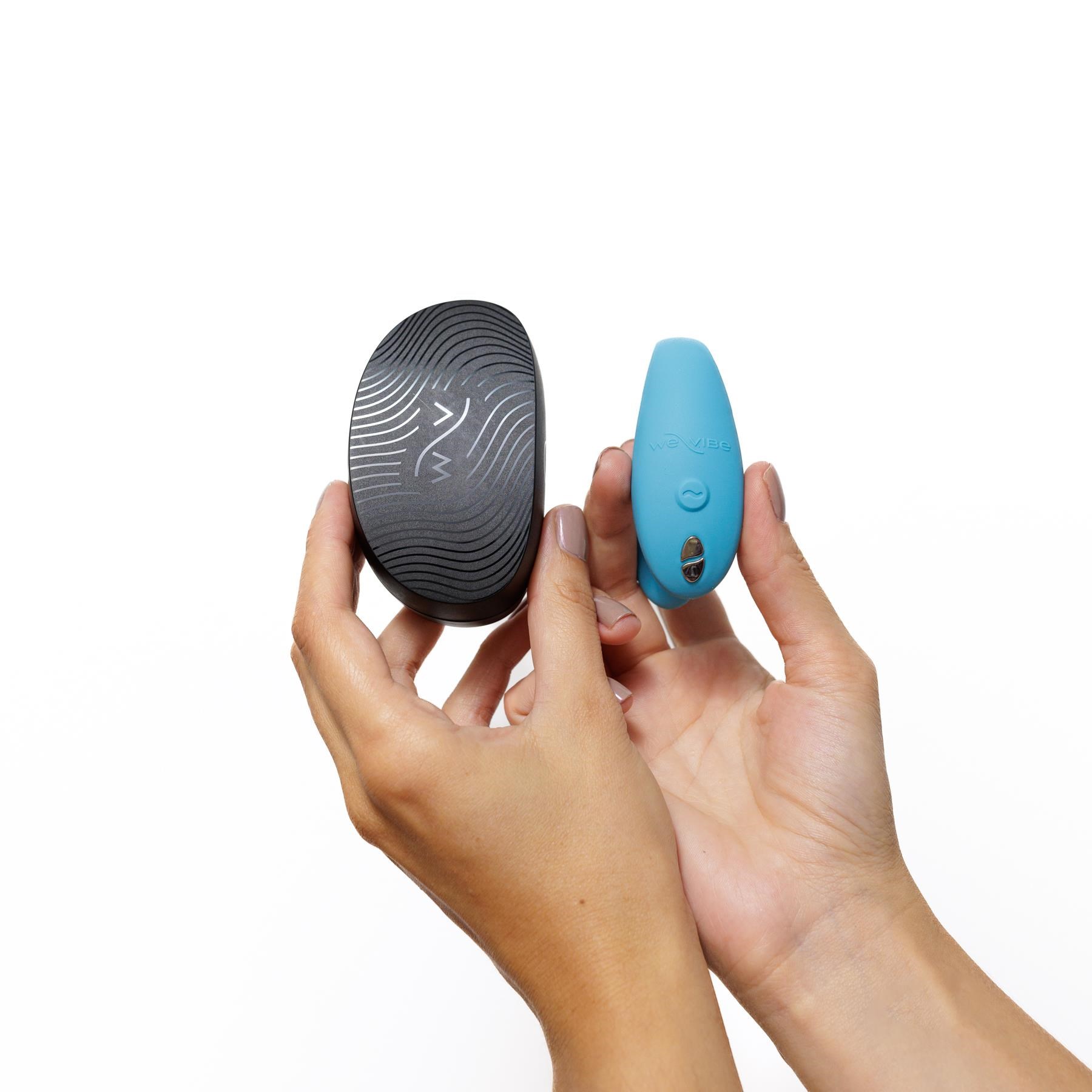 We-Vibe Sync Go Couples Vibrator- Hand Shot to Show Size