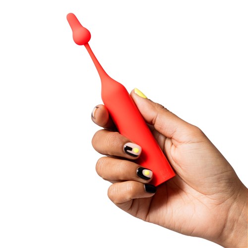 Romp Pop Clitoral Vibrator- Hand Shot to Show Size