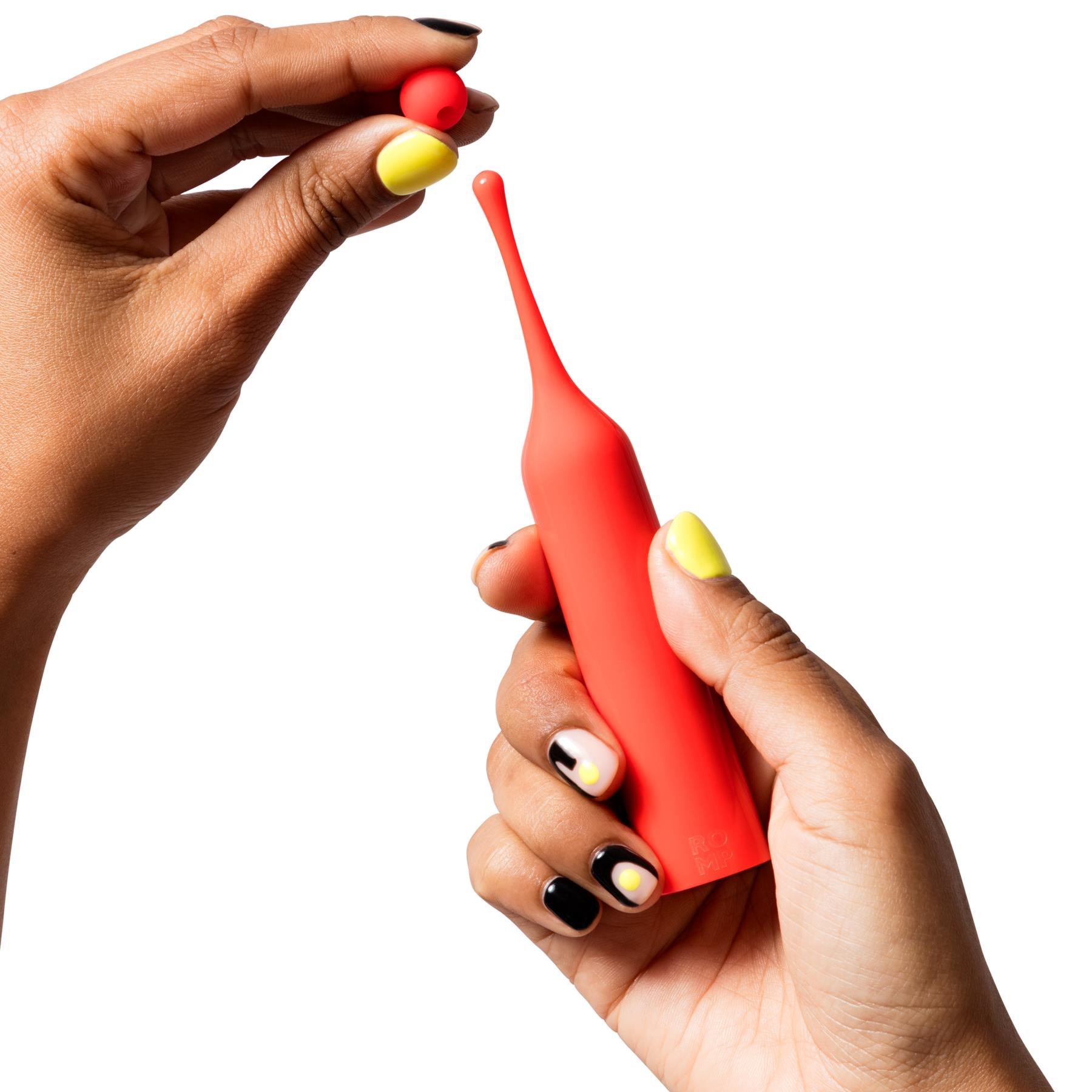 Romp Pop Clitoral Vibrator- Hand Shot to Show How Tip Is Placed