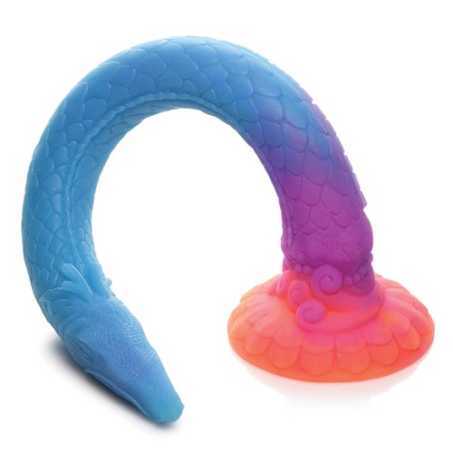 Mikara - Glow-in-the-Dark Silicone Snake Dildo curved on table