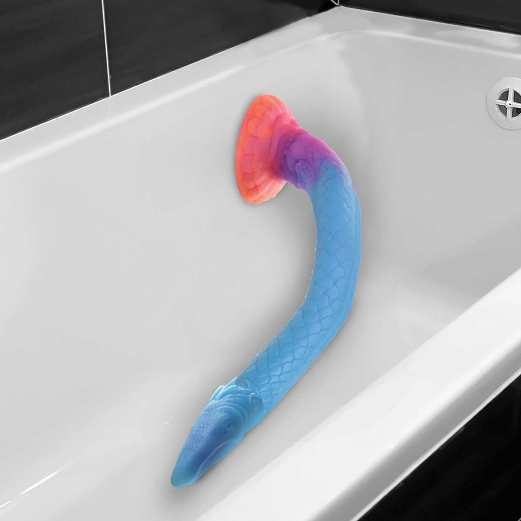 Mikara - Glow-in-the-Dark Silicone Snake Dildo mood shot in bathtub