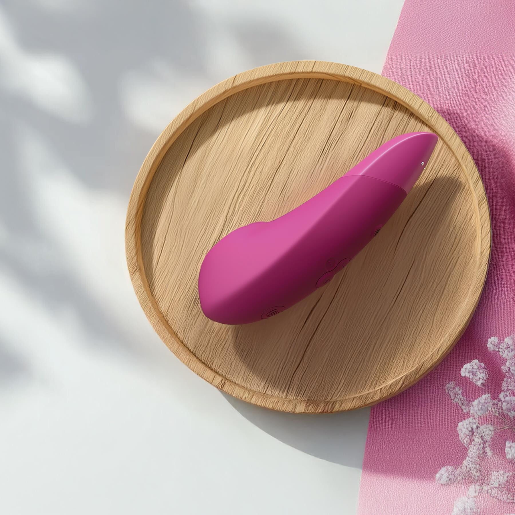 Womanizer Enhance Pleasure Air Clitoral Stimulator pink lifestyle view 2