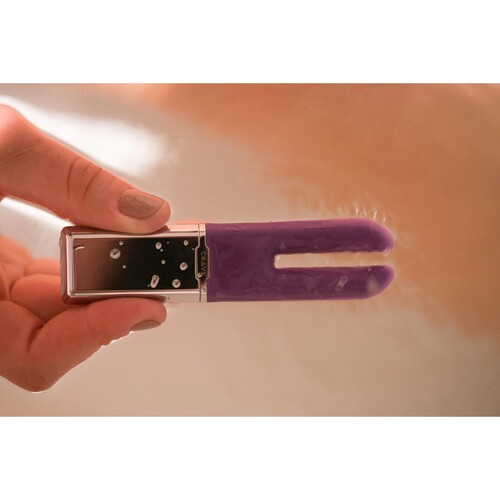 Crave Duet Classic Vibrator in hand