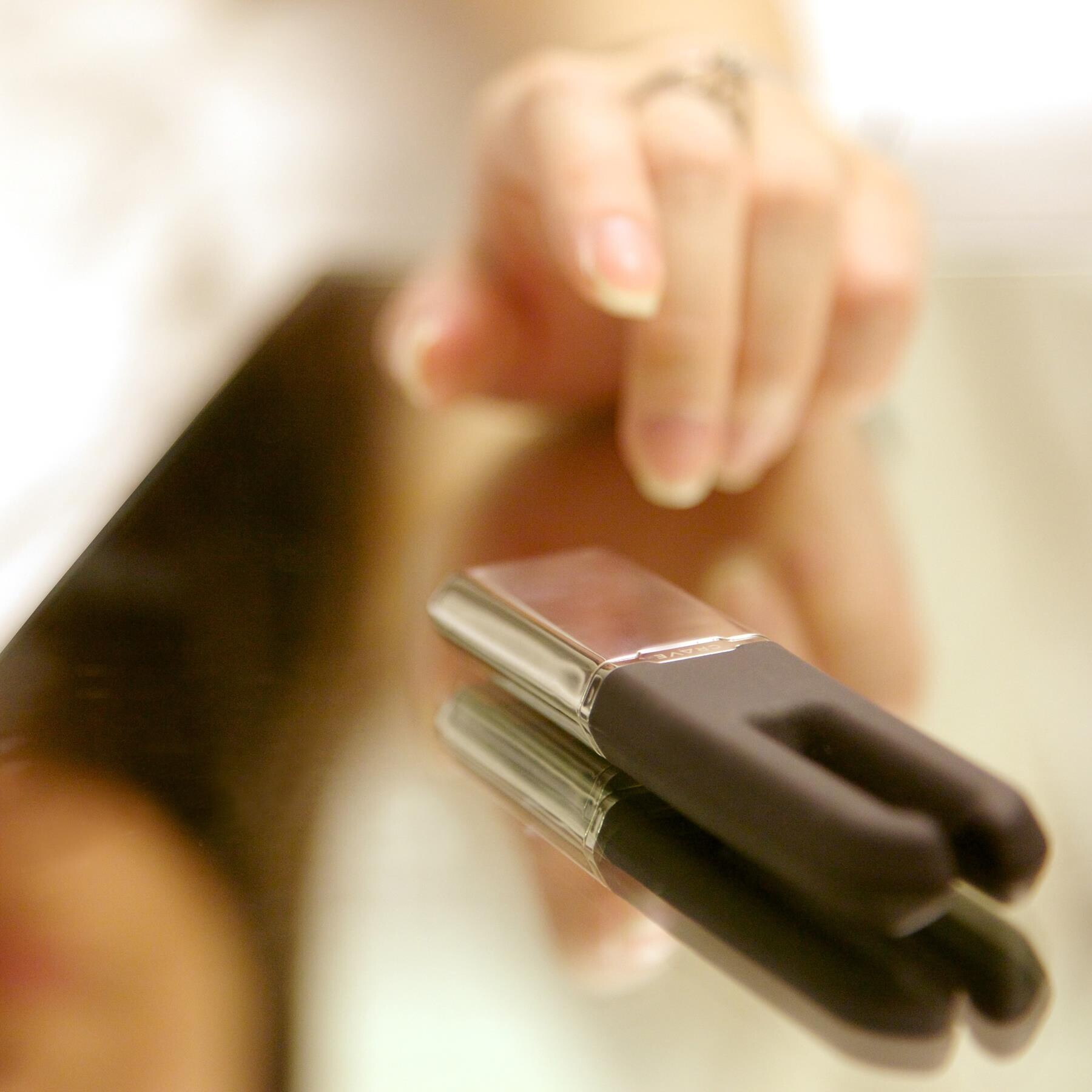 Crave Duet Classic Vibrator on table