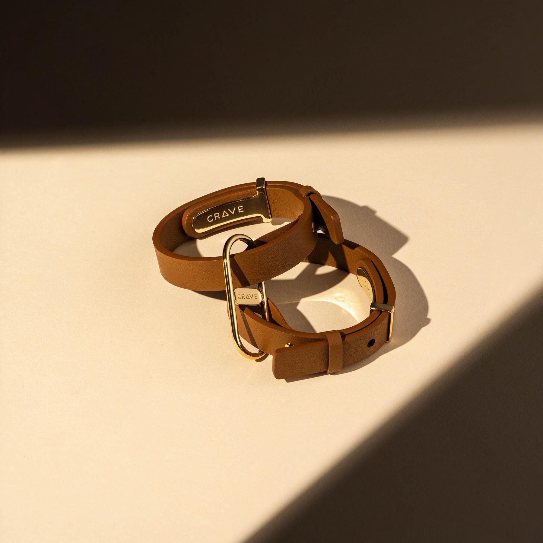 Crave Icon Leather Cuffs tan lifestyle shot 2