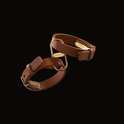 Crave Icon Leather Cuffs tan with background