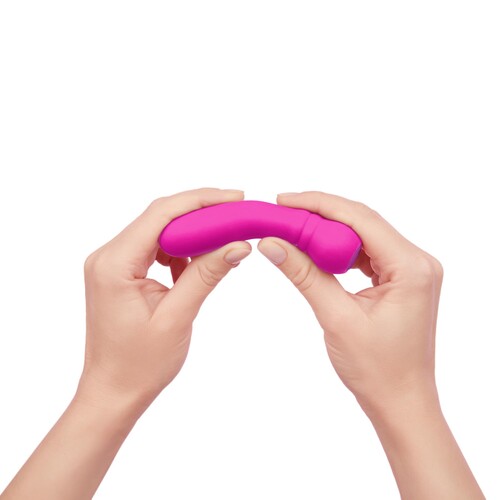 Femme Funn Ultra Bullet Massager pink in hand showing flexibility