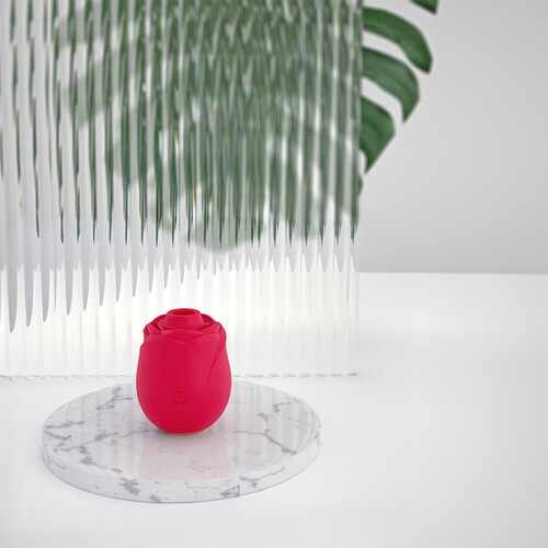 Womanizer Pleasure Air Rose - Lifestyle Shot on Table