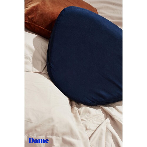 Dame Pillo Sex Pillow on bed