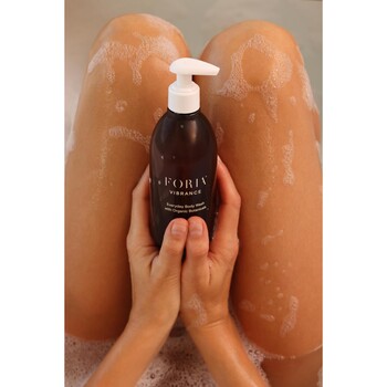 Vibrance body wash with organic botanicals in shower