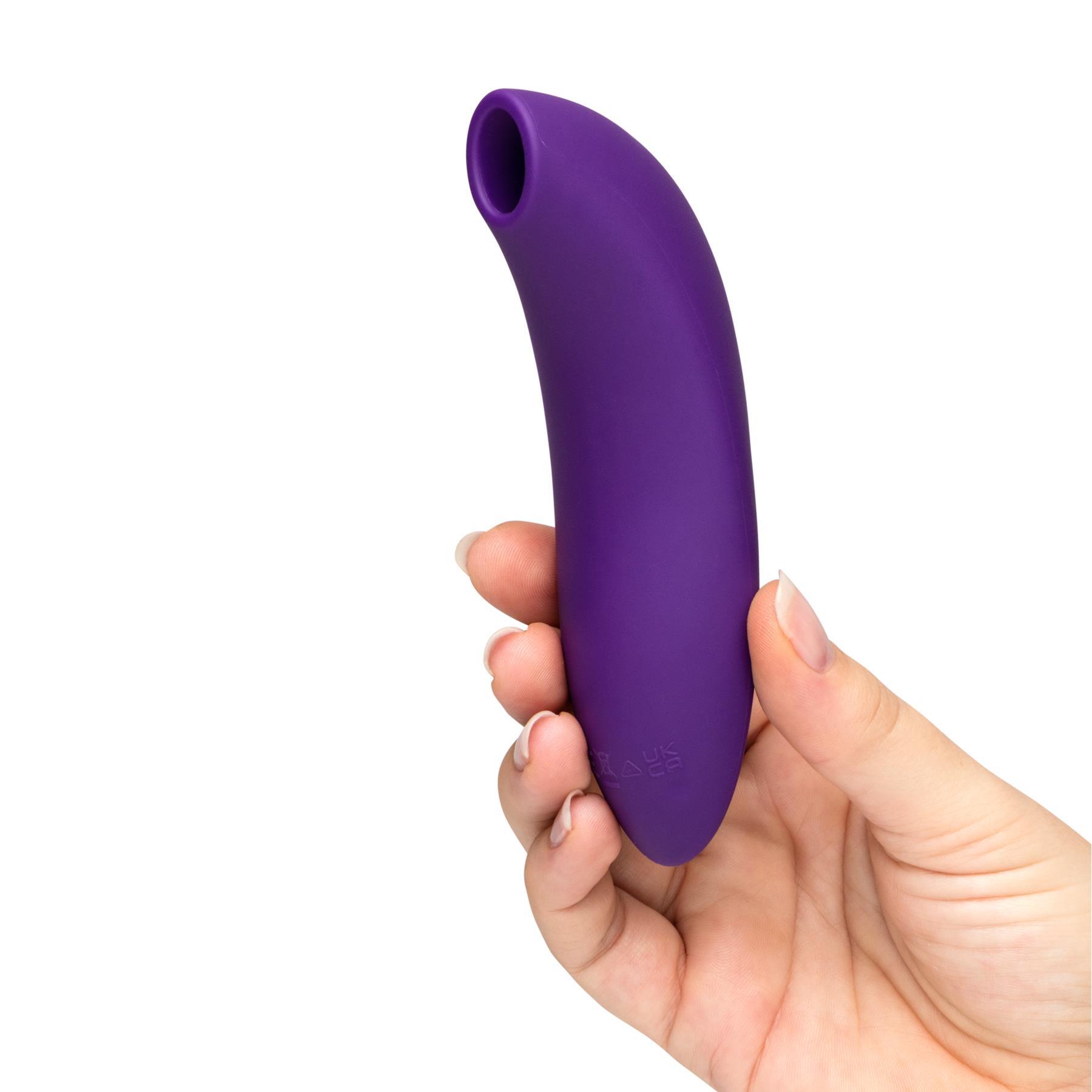 We-Vibe Pleasure Air Melt 2 - Hand Shot 2 color purple