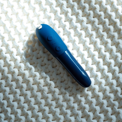 We-Vibe Tango X Bullet Vibrator laying flat color blue