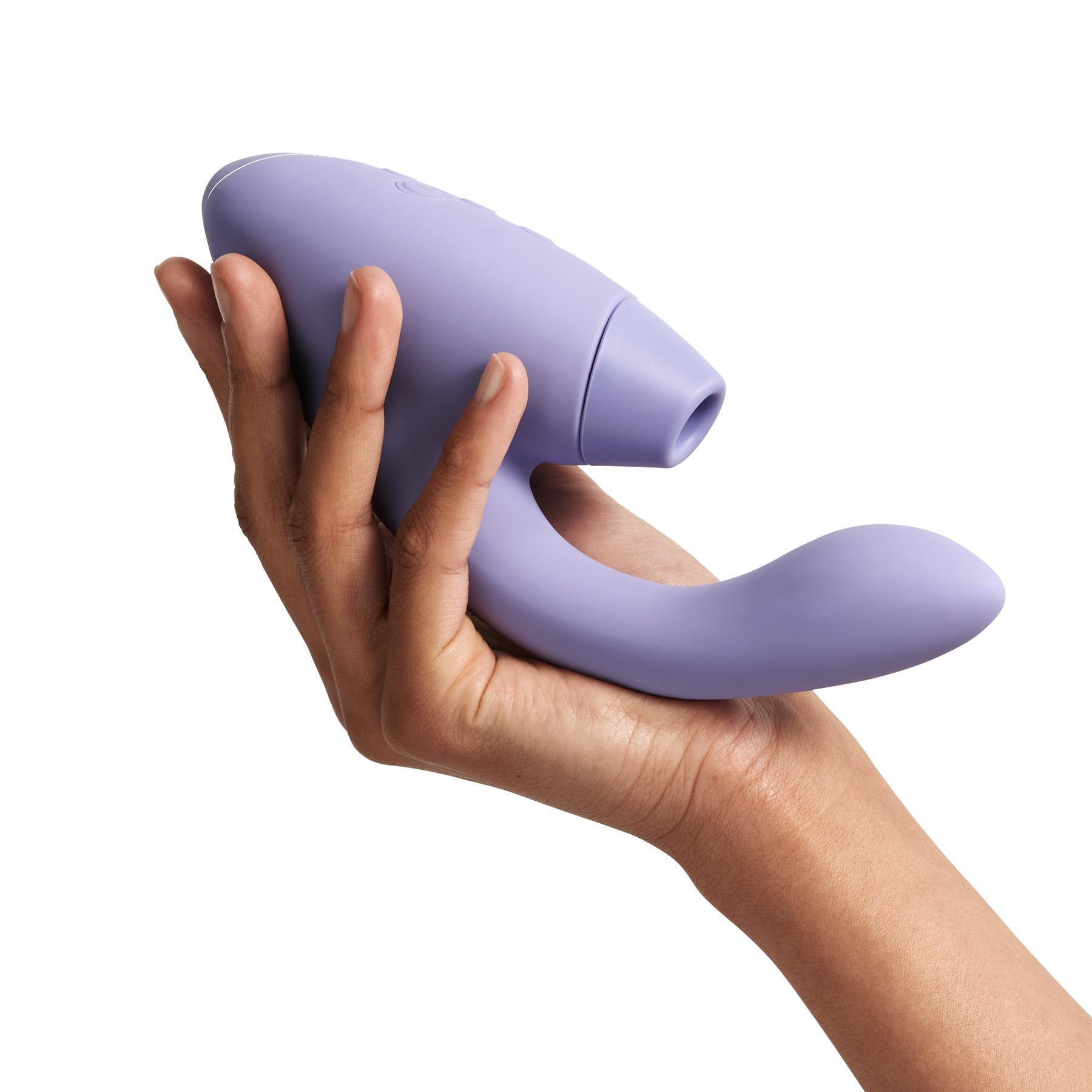Womanizer Duo 2 Dual Stimulator  color purple in hand