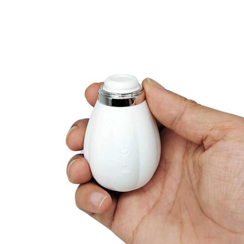Tapping Snowman with Clit Stim Attachment - Hand Shot - Tapper