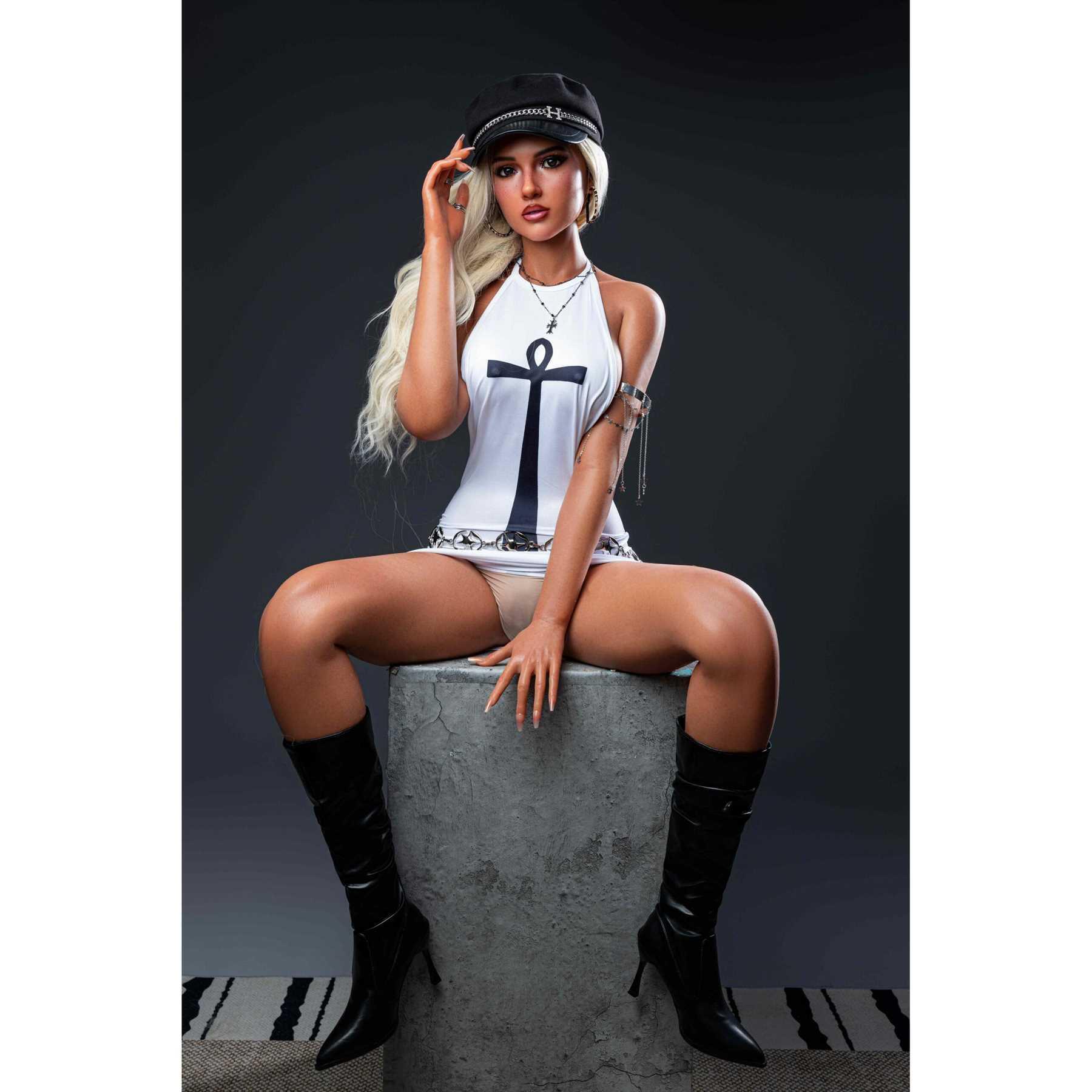 Love doll Natalie seated wearing tight dress