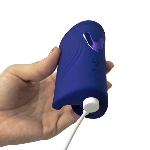 Grip It Male Trainer - Hand Shot - Showing Where Charging Cable is Placed
