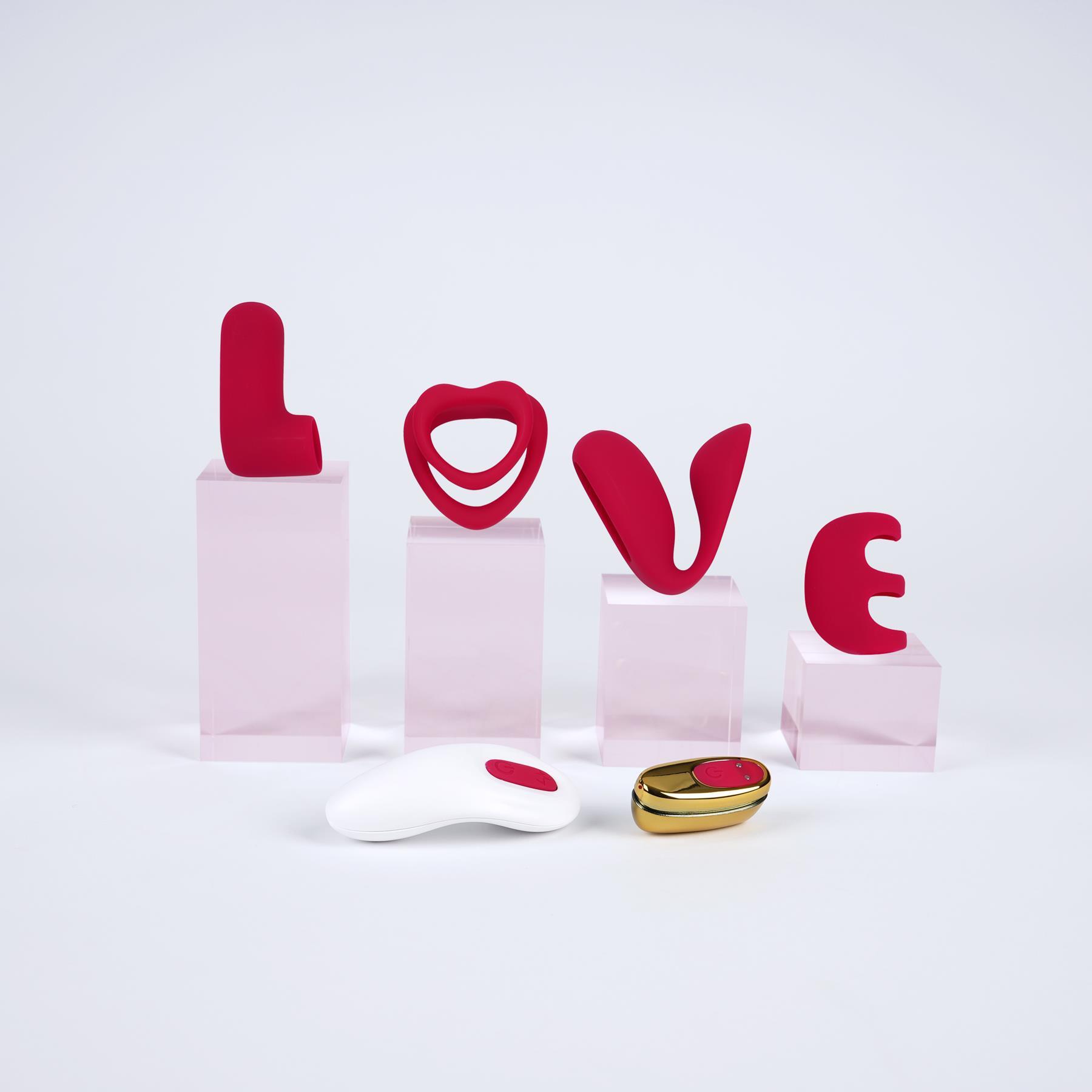 Adam & Eve L-O-V-E Interchangeable Vibrator Collection - Products on Risers