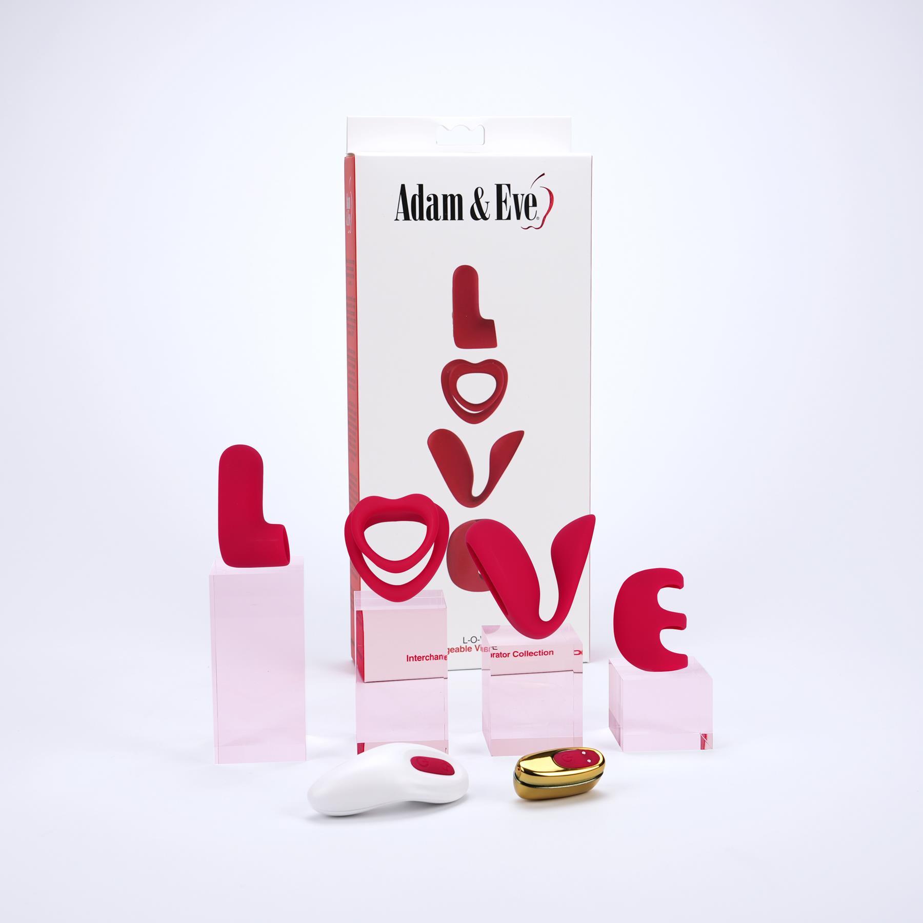 Adam & Eve L-O-V-E Interchangeable Vibrator Collection - Packaging and Product on Risers