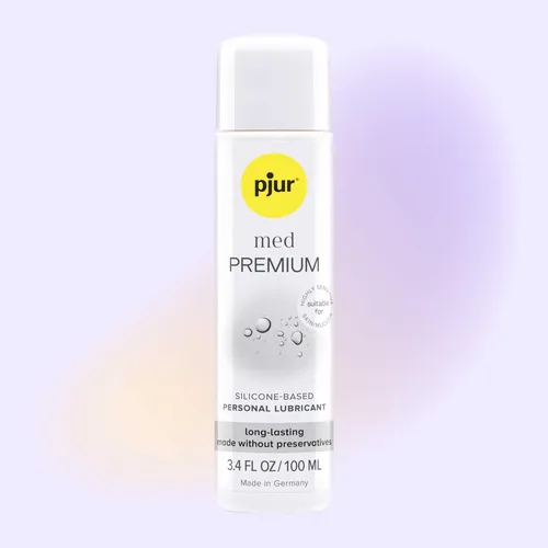 pjur med PREMIUM front of bottle with background color